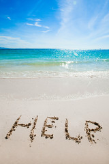 Fototapeta premium Help Sign on the beach