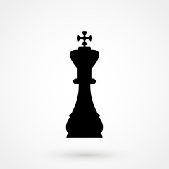 A black and white silhouette of a chess piece - King