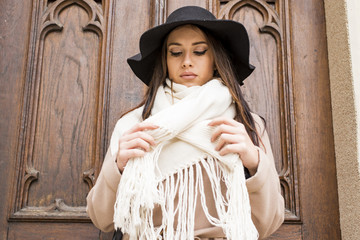 Pretty young woman with hat