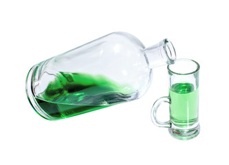 Bottle and glass filled with green strong drink