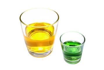 Glasses with a yellow and green drinks
