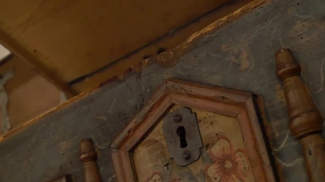 Lock of an old chest. Opening an old wooden cabinet.