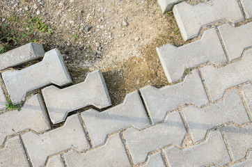 Destroyed Paving of the Sidewalk. The destroyed Laying of Paving Slabs