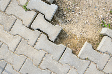 Destroyed Paving of the Sidewalk. The destroyed Laying of Paving Slabs