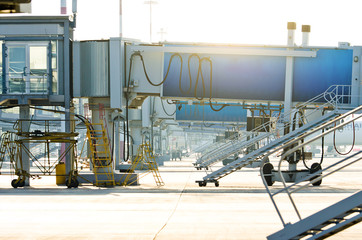 Airport terminal. Airport jet bridge. Airport jetway, aerobridge, skybridge. Passenger boarding bridge.