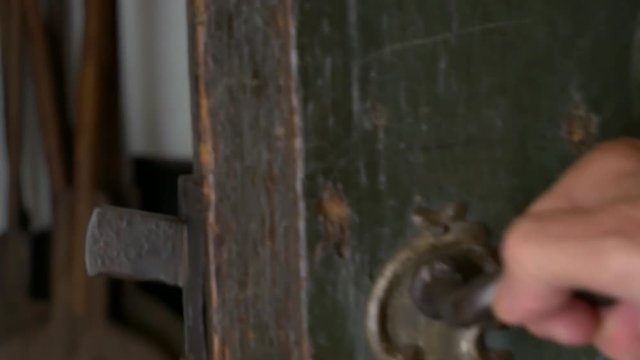 Open the old door handle