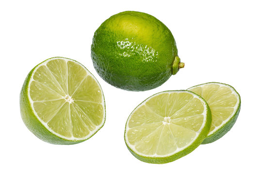 Whole and slices of juicy lime fruit