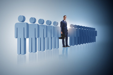 Standing out from crowd concept with businessman