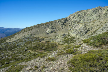Glacial lagoon next to the Pico del Nevero (Snowfield Peak; 2.209 metres), in Guadarrama Mountains National Park, Spain.