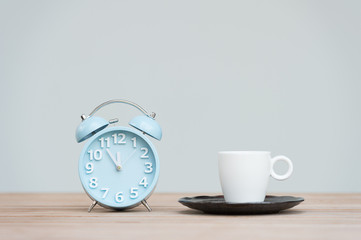 time for tea, retro alarm clock and tea cups