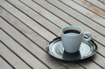 Coffee cup on wooden tables 
