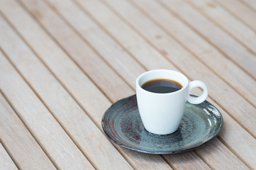 Coffee cup on wooden tables 