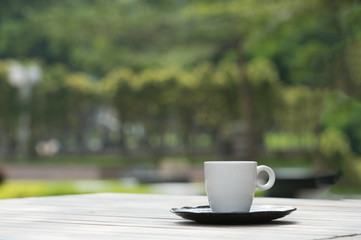 Coffee cup on wooden tables 