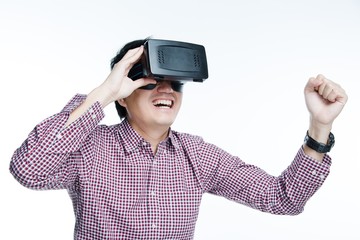 Man wearing virtual reality goggles excited mood. Studio shot, white background.