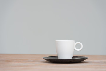 Coffee cup on wooden tables 