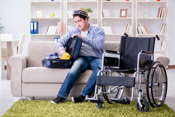 Young disabled man preparing for summer vacation