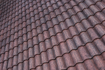 Red roof top tiles over a long time.