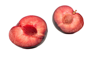 Two halves plums