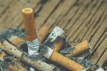 smoking a cigarette. pulverize the floor.