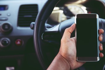 using  smart phone mobile phone in car.