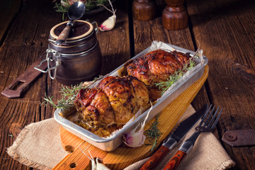 small Rolling roasts fully with dried fruit and bacon