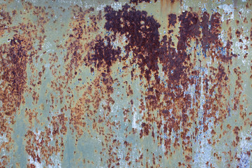 Old rusty metal texture background. A dark shabby rusty old metal texture fence or wall. Abstract banner with copy space.