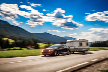 Family vacation travel, holiday trip in motorhome RV, caravan car motion blur