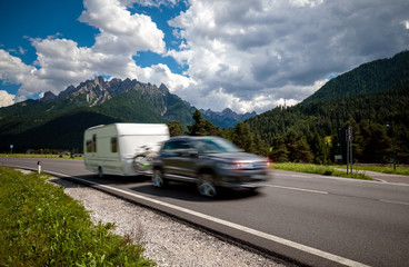 Family vacation travel, holiday trip in motorhome RV, caravan car motion blur