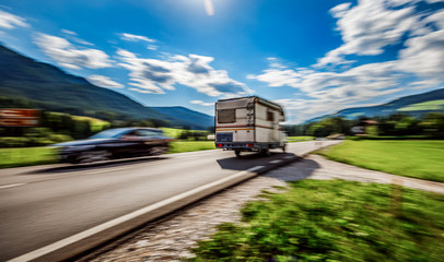 Family vacation travel, holiday trip in motorhome RV, caravan car motion blur