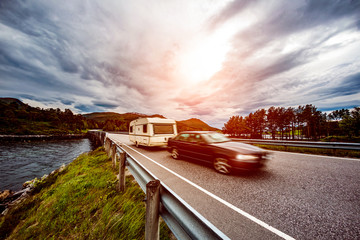 Family vacation travel, holiday trip in motorhome, caravan car motion blur