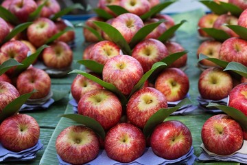 Close up Pile fresh organic red apples from the local farmers market.