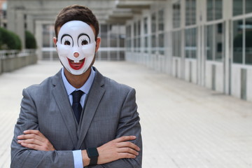 Scary businessman wearing a mask 