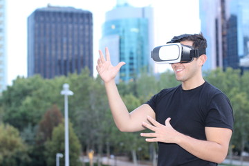 Young boy enjoying the virtual reality in the city 