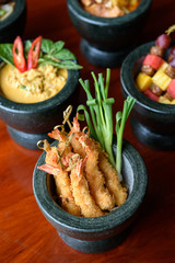 Set of Thai dishes in cute mortar