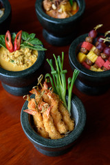 Set of Thai dishes in cute mortar