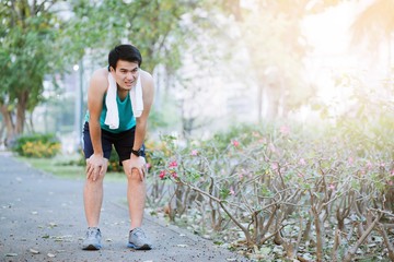 Man paleface joggers tired and be exhausted weary on parks.