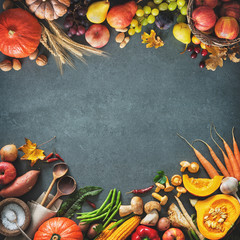 Thanksgiving day or seasonal autumnal background with pumpkins, vegetables and fruits