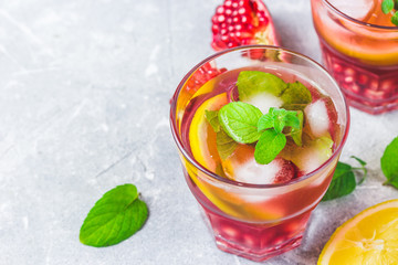 Festive holiday pomegranate  drinks. Selective focus, space for text. 