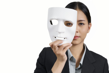 asian woman with white mask and a business suit on white background, concept, spying or ambiguous. - 174952321