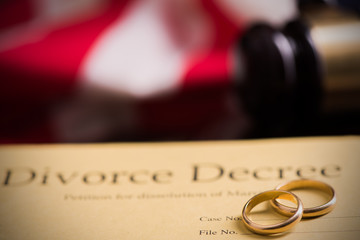 Divorce decree and gavel on a table.