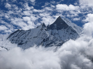 Mount Machapuchare, Fishtail mountain through cloud window, amazing day in Annapurna Base camp, Nepal