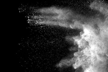 Explosion of white dust on black background. - 174952940
