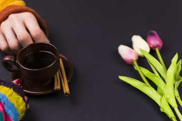 The man gives the girl the tea. Close-up