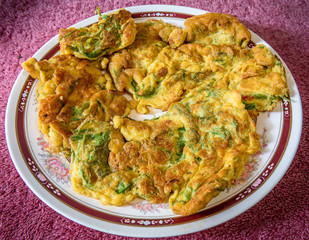 Omlet with Vegetables in the disk.