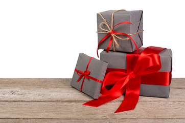 Christmas holiday gift boxes wrapped in paper on white background
