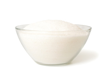 Sugar in glass bowl, isolated.