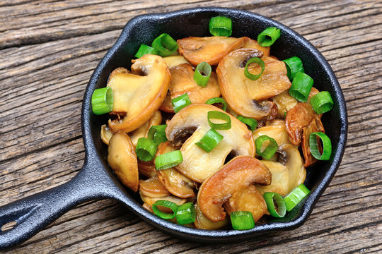 Mushroom in a frying pan on table