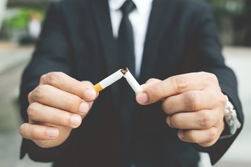 A new generation of businessman refusing cigarettes concept for quitting smoking and healthy...