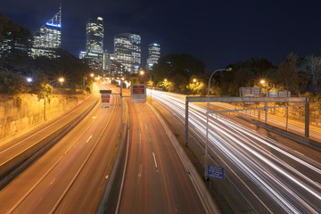 Fototapeta na wymiar Multi lane cross city highway in Sydney, Australia, from above towards city CBD.