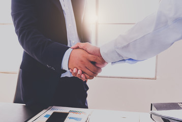 businessman shaking hands each other.